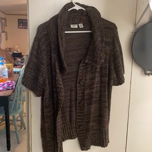 A sweater type over shirt short sleeve button up